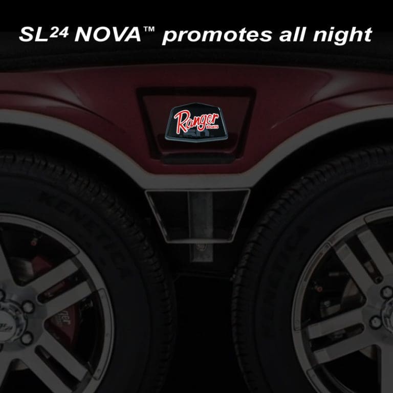 SL24 Nova badge lit up at night