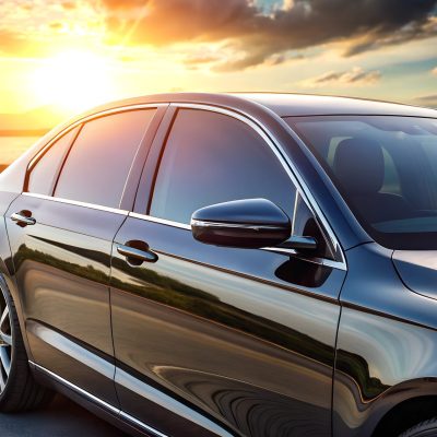 High-tech ceramic window tint on luxury vehicle, sleek design with sun protection features High-tech ceramic window tint on luxury vehicle, sleek design with sun protection features